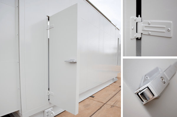 Heavy-duty acoustic door installed in an industrial plant.
